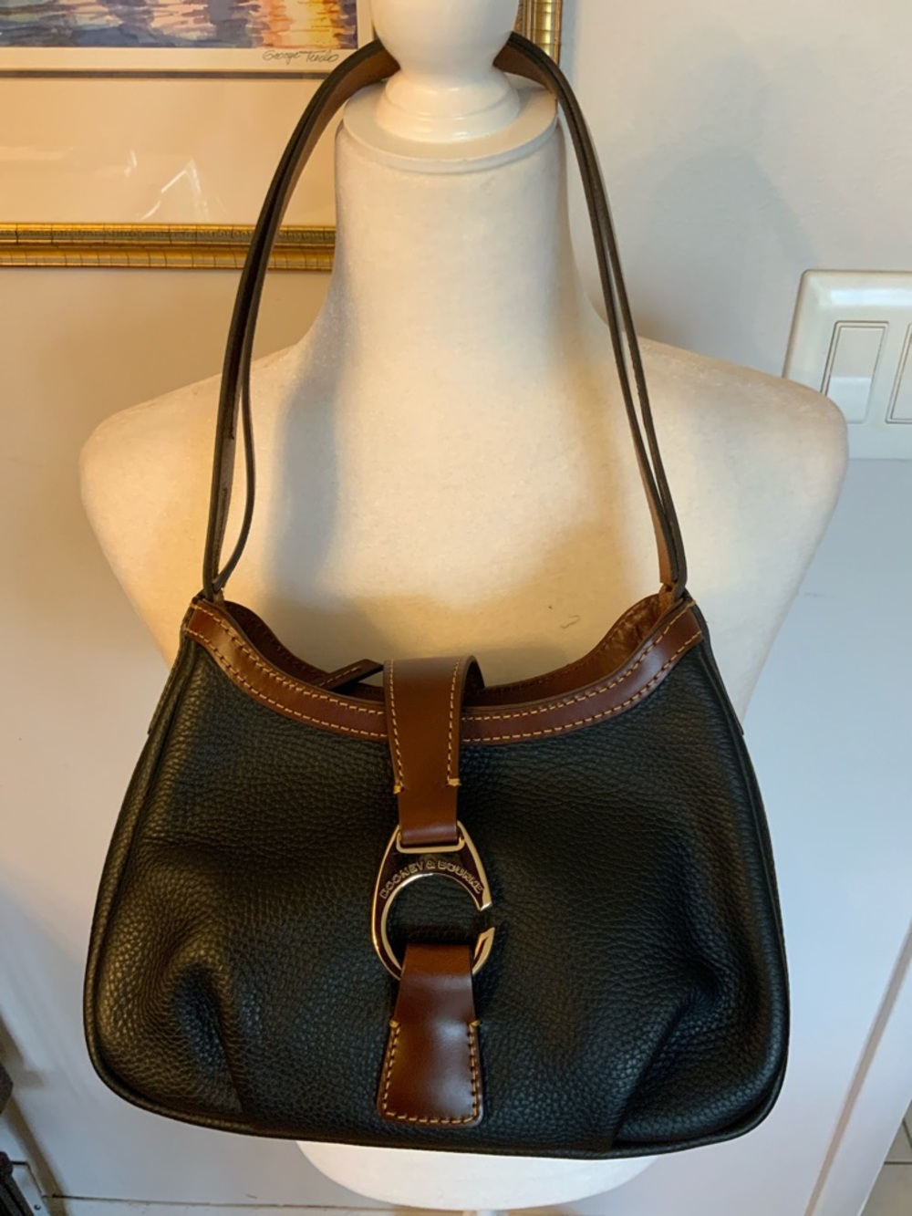 Dooney & Bourke Black Pebbled Leather Hobo with Brown Trim and Gold Ring